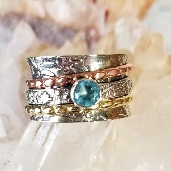 Jewelry - Spinner Genuine Blue Topaz ring 925 3 tone sz 9